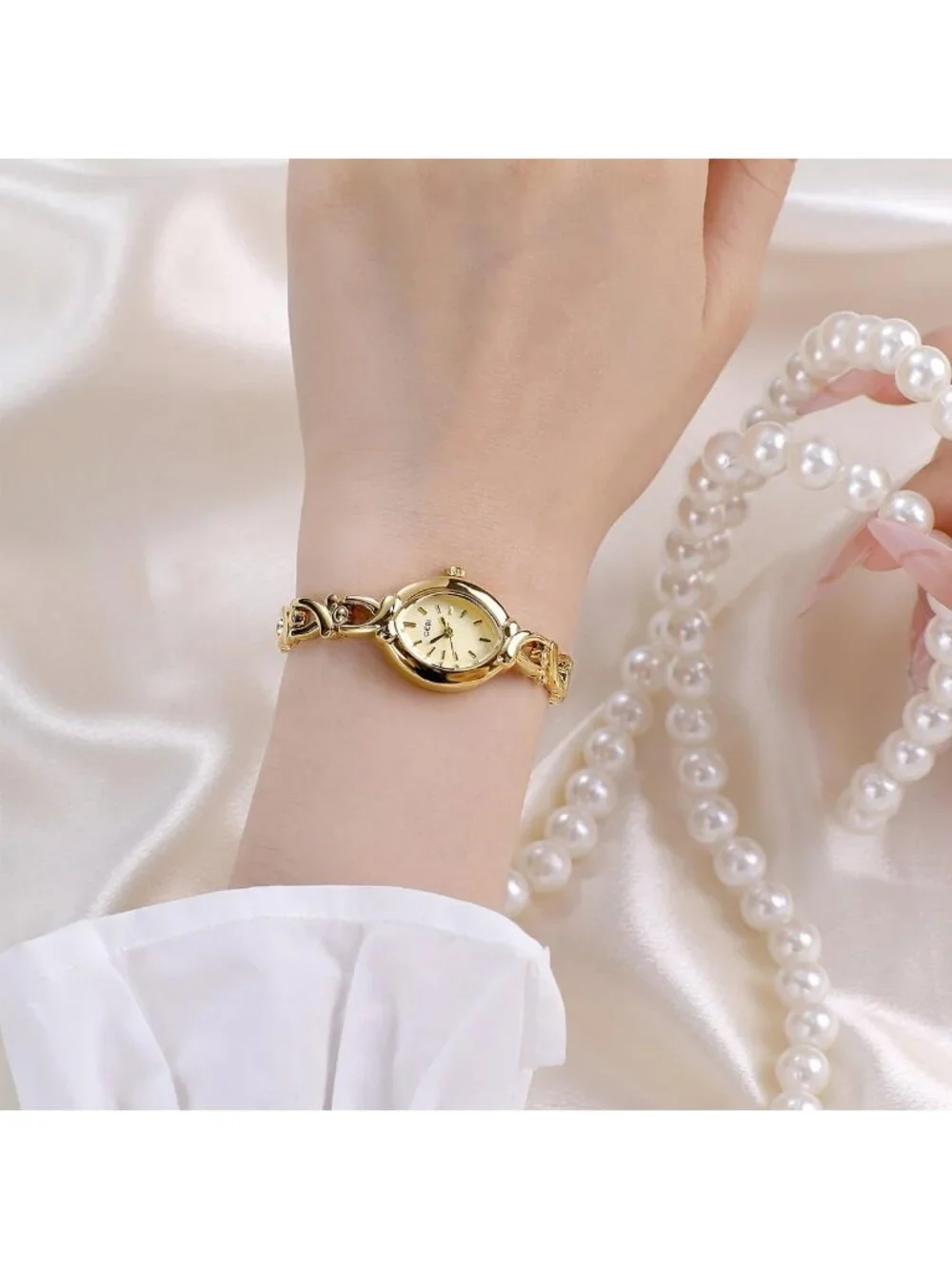 Womens Gold Analog Quartz Alloy Steel Oval Roman Numeral Number Bracelet Watch